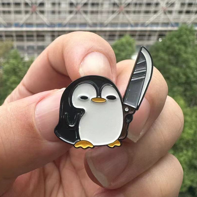 Grappige pinguïn met grote mes - Edc Everyday Carry Knives recensie en prijs