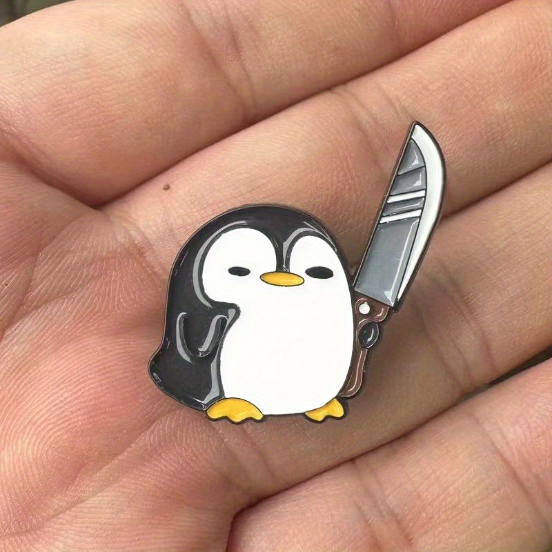 Grappige pinguïn met grote mes - Edc Everyday Carry Knives recensie en prijs